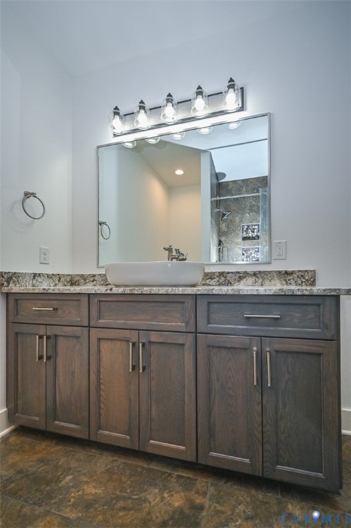 4141 Charles City Road Henrico, VA 23231 - Photo 18 of 35 a bathroom with a granite countertop sink and a mirror