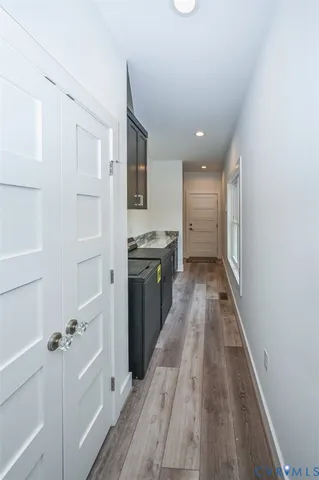 a view of a kitchen with a sink and a stove top oven