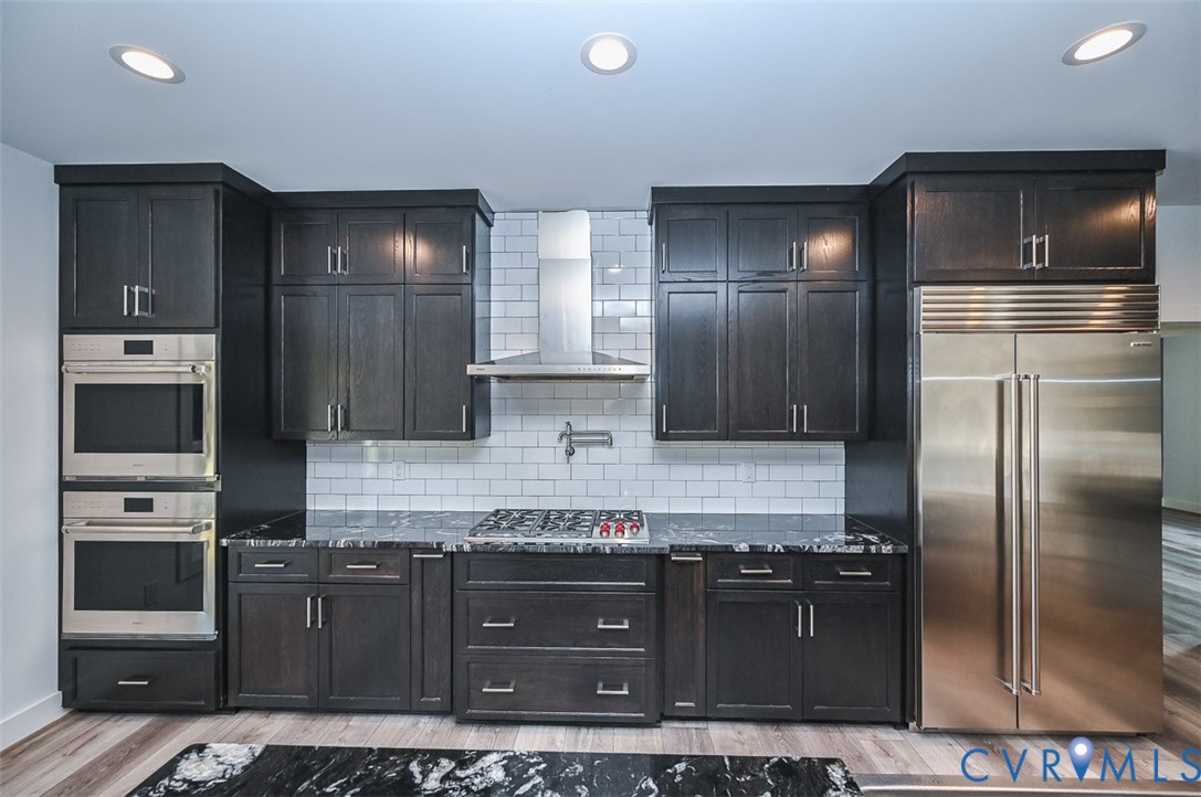 4141 Charles City Road Henrico, VA 23231 - Photo 9 of 35 a kitchen with stainless steel appliances granite countertop a refrigerator and a stove