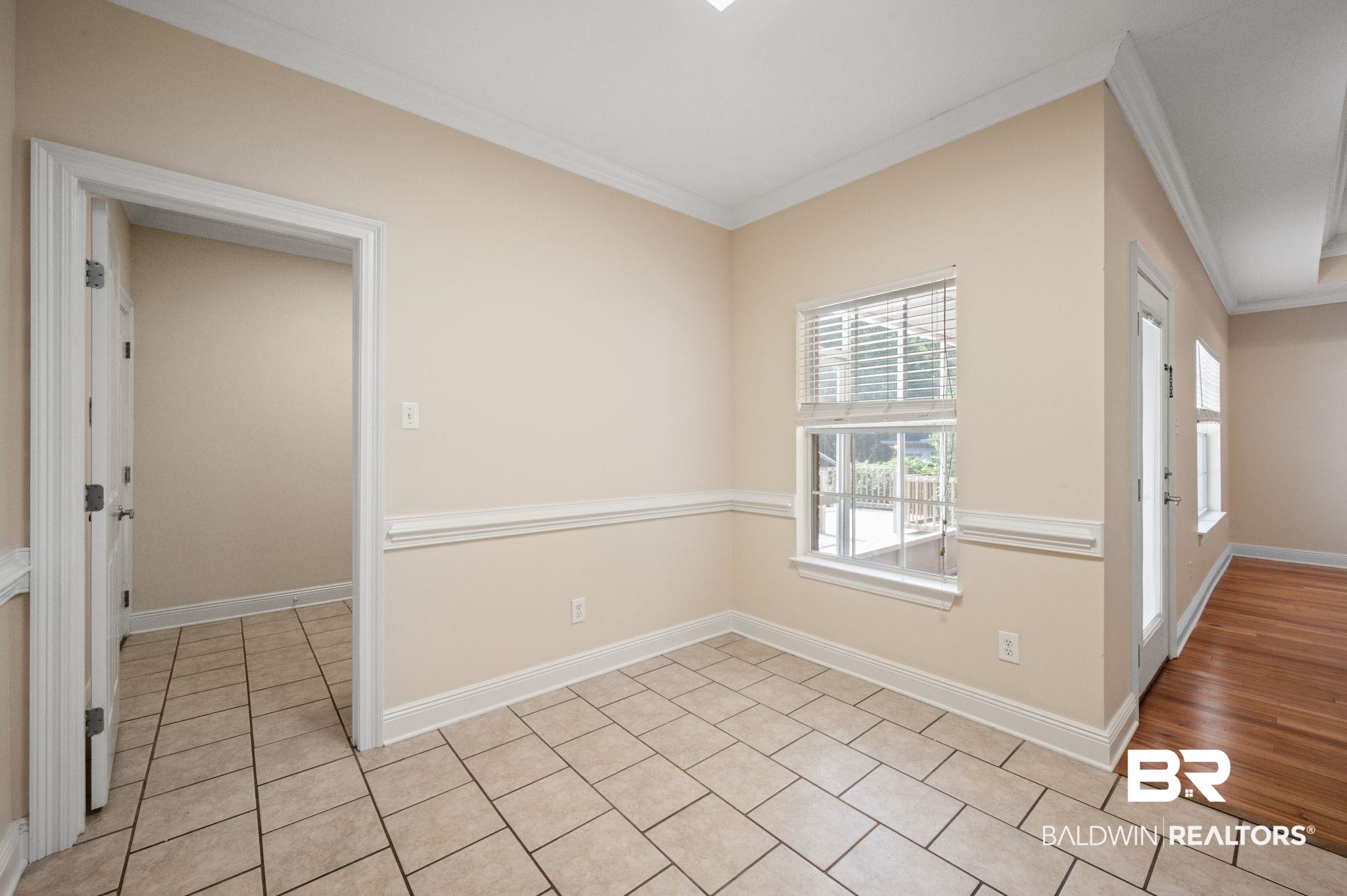 2041 Ridgeline Drive Mobile, AL 36695 - Photo 12 of 43 Tiled spare room with ornamental molding