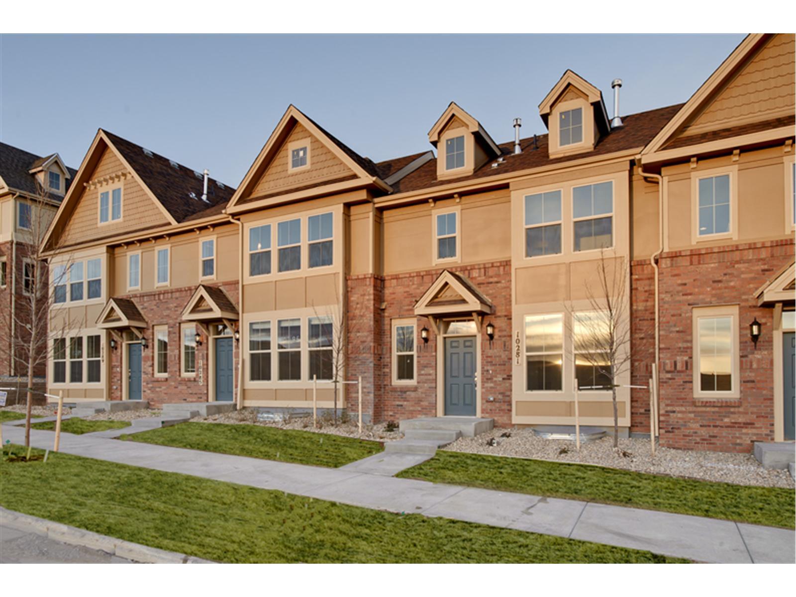 10322 Bellwether Lane Lone Tree, CO 80124 - Photo 1 of 1 a front view of a house with a yard