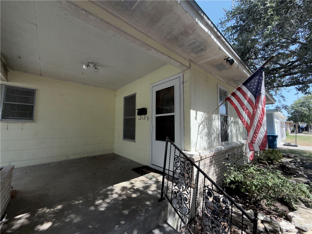 1608 Austin Street Portland, TX 78374 - Photo 2 of 24 a view of a house with backyard and sitting area