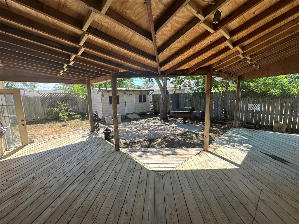 1608 Austin Street Portland, TX 78374 - Photo 23 of 24 a view of a backyard with wooden floor