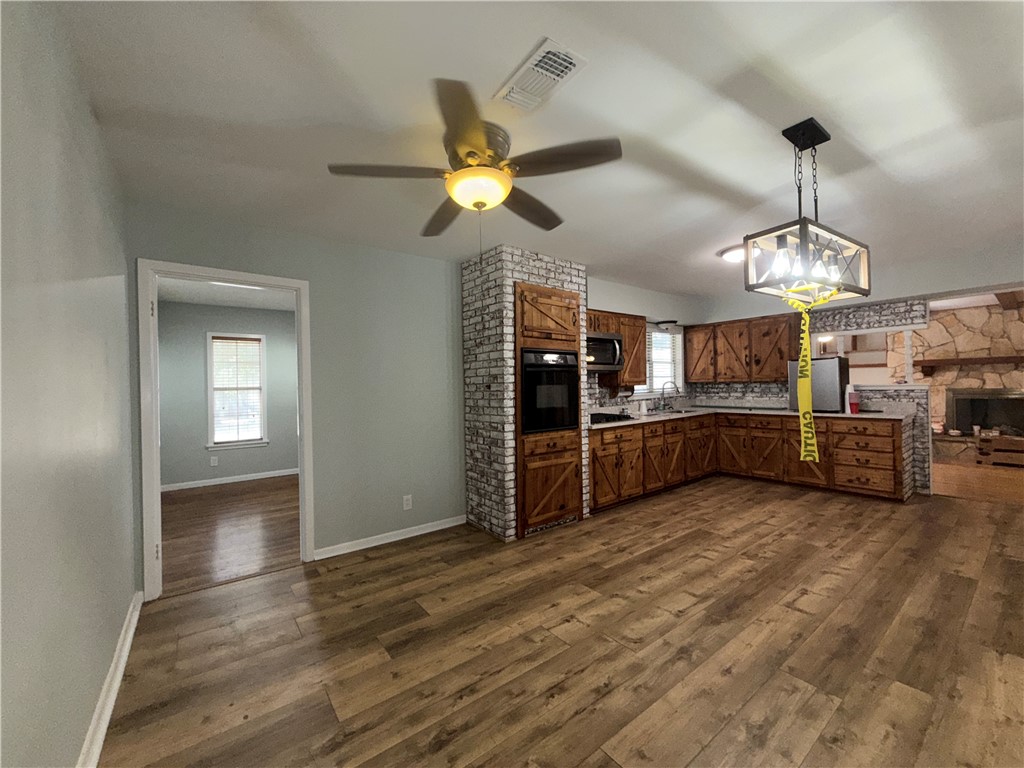 1608 Austin Street Portland, TX 78374 - Photo 10 of 24 a view of a room with kitchen and window