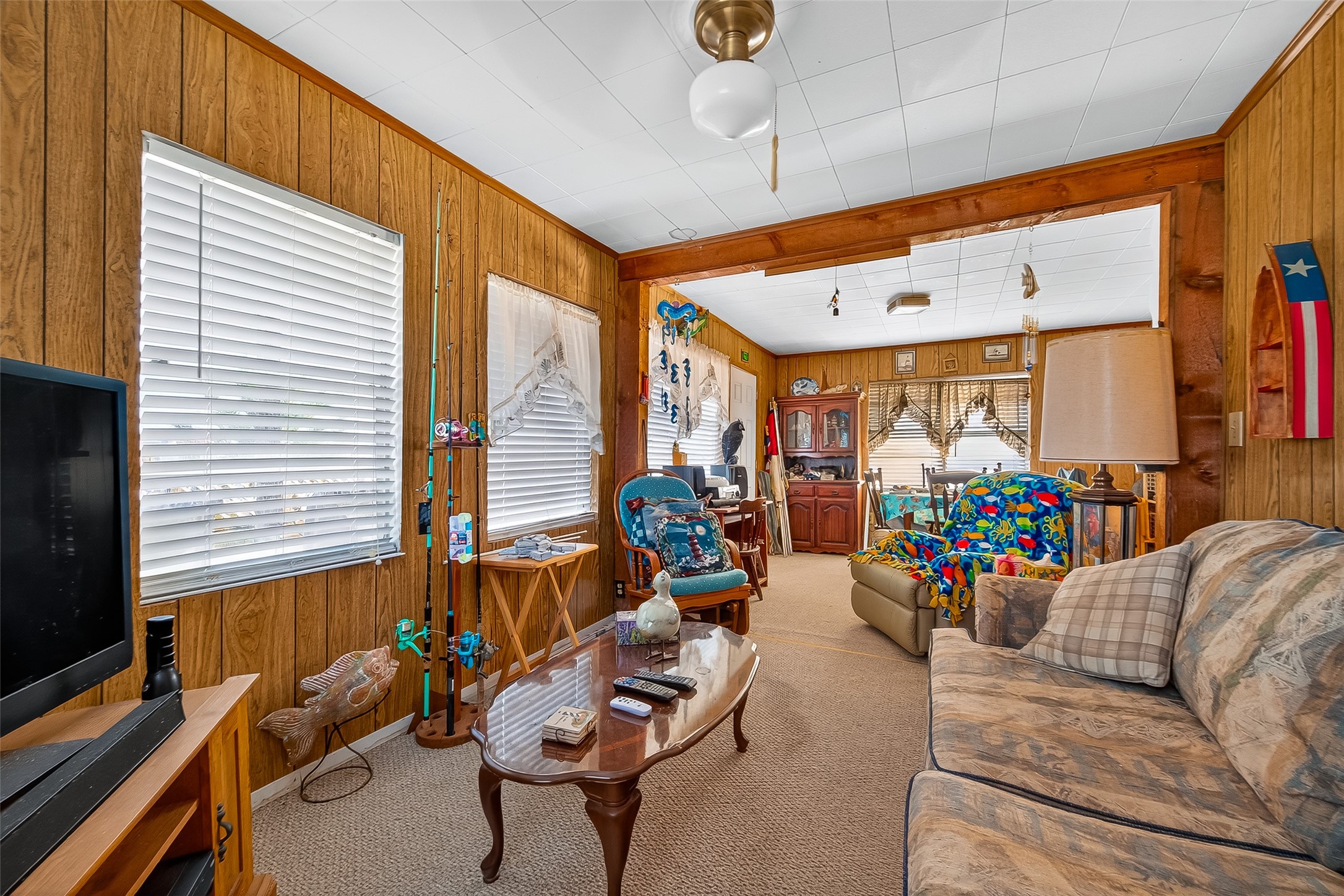 1870 Hall Road Sargent, TX 77414 - Photo 25 of 50 a room with furniture and a large window