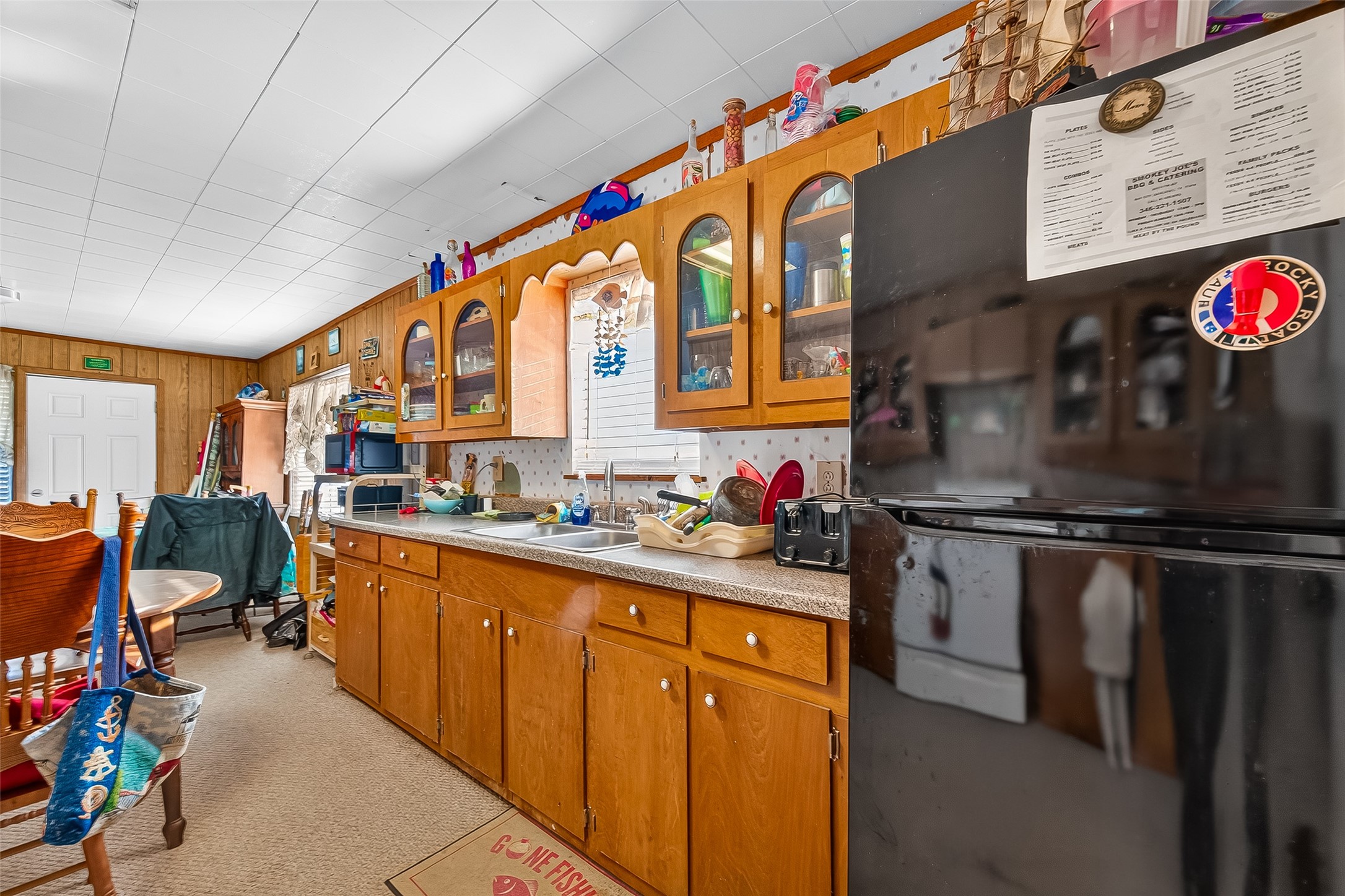 1870 Hall Road Sargent, TX 77414 - Photo 33 of 50 a kitchen with stainless steel appliances a stove and a refrigerator