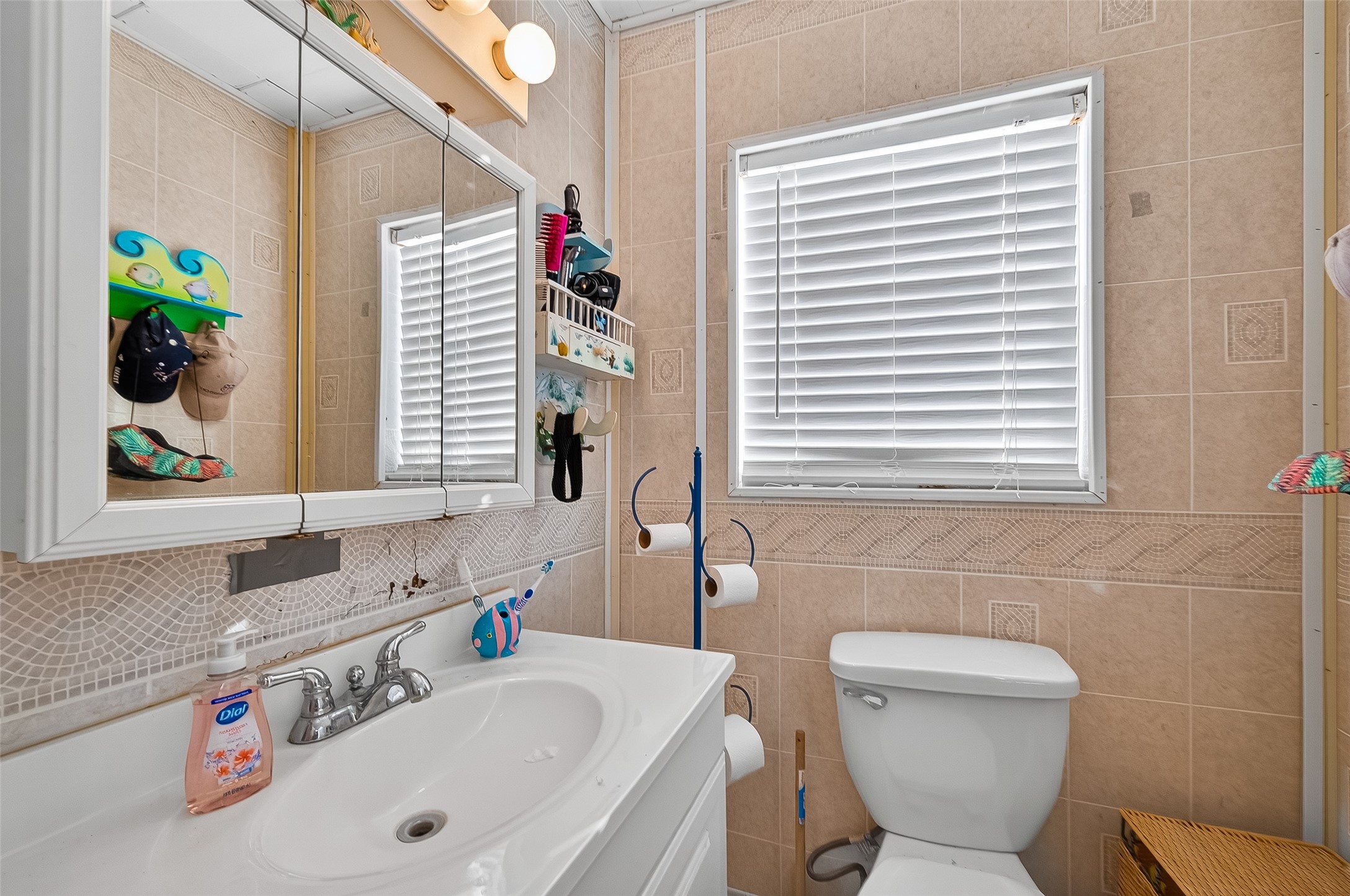 1870 Hall Road Sargent, TX 77414 - Photo 35 of 50 a bathroom with a sink and a toilet
