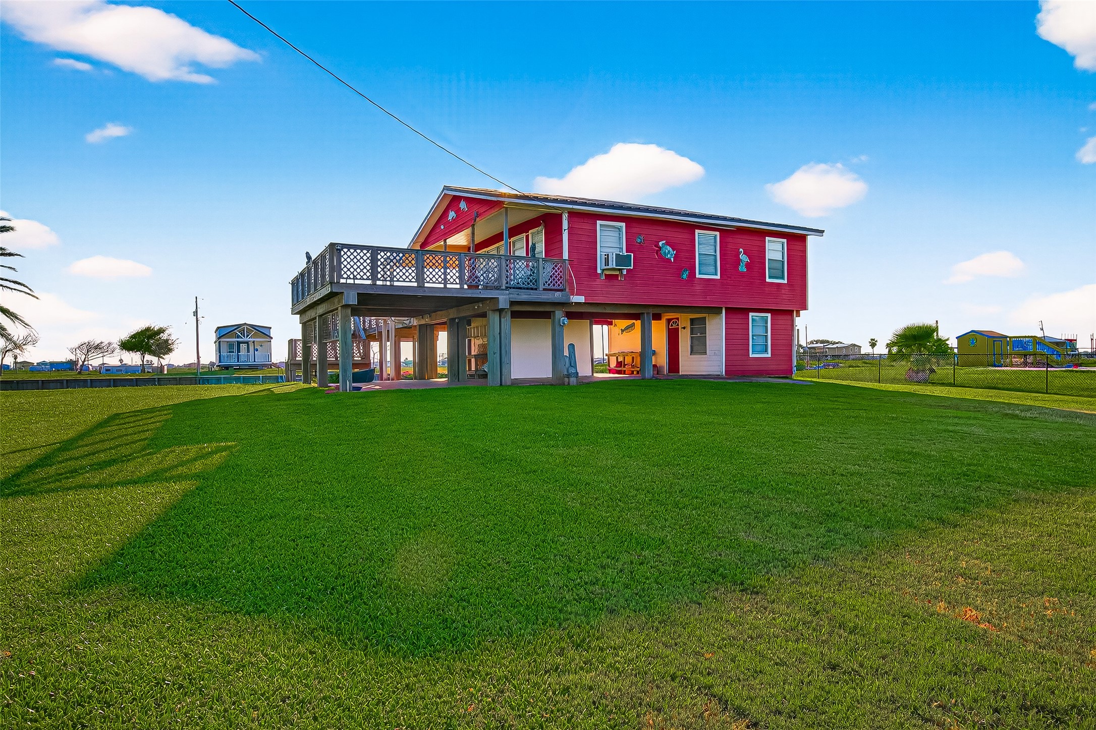 1870 Hall Road Sargent, TX 77414 - Photo 4 of 50 a view of a house next to a big yard