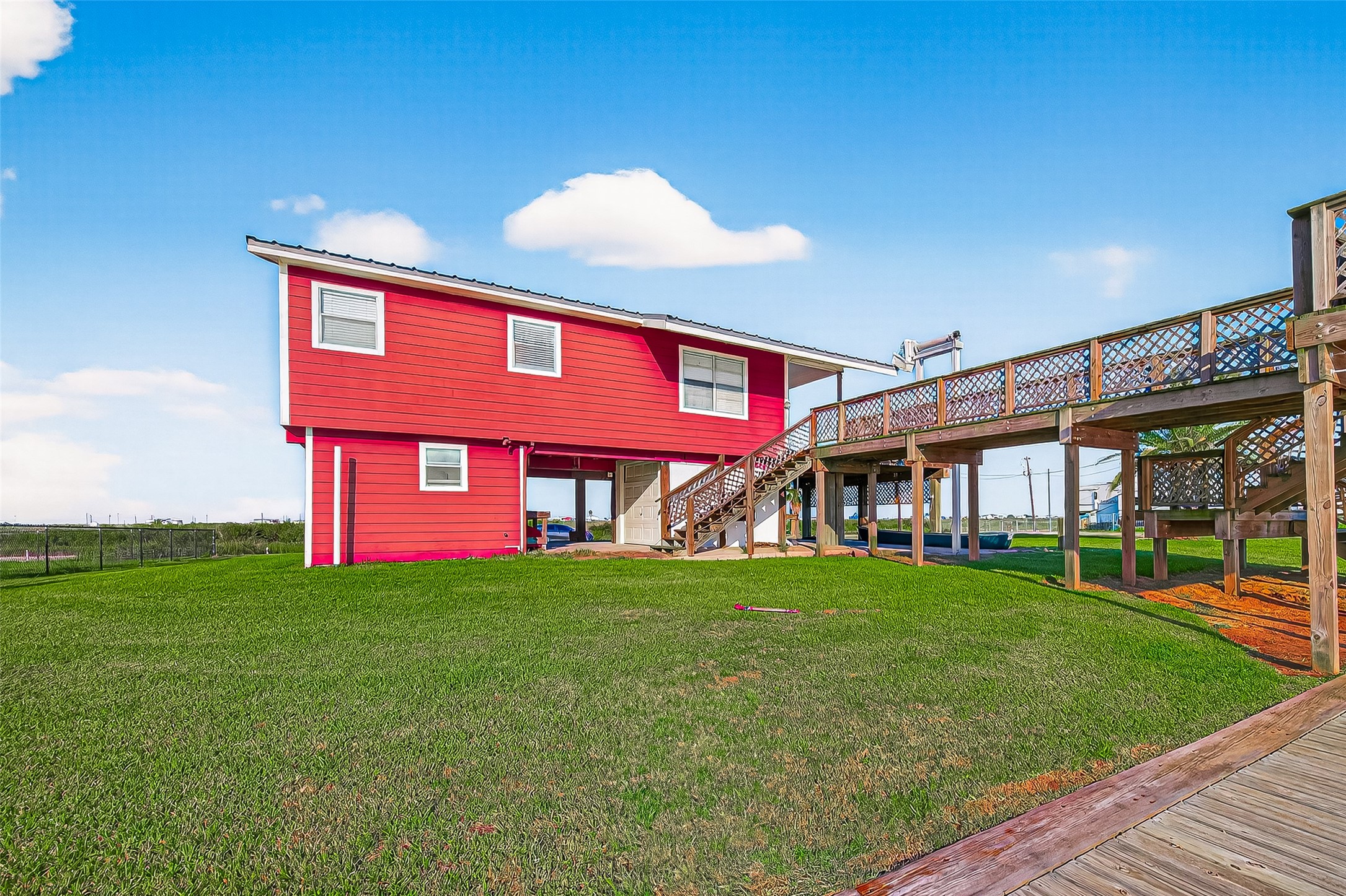1870 Hall Road Sargent, TX 77414 - Photo 41 of 50 a view of a house with a yard