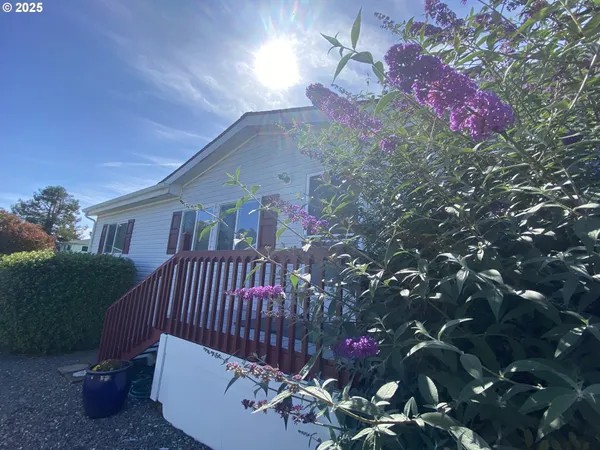 a view of a porch with a bench