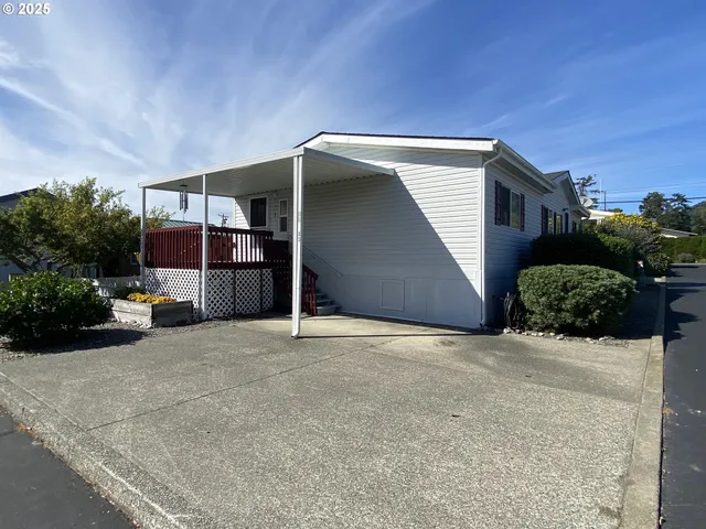a view of a house with a garage