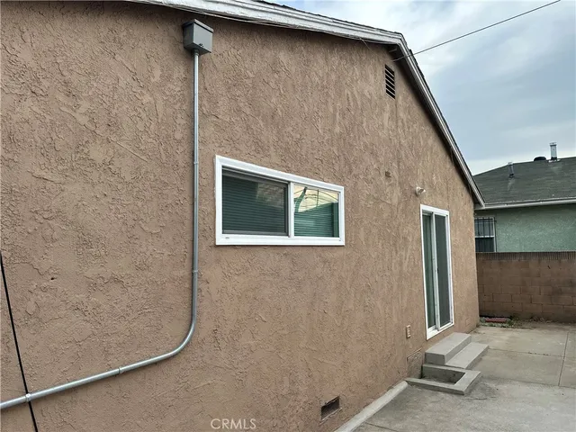 a brick house with a door