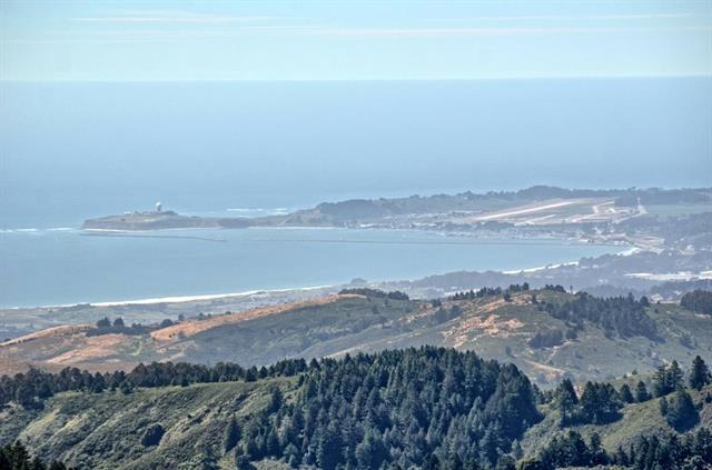 254 Swett Road Woodside, CA 94062 - Photo 20 of 24 a view of an ocean beach and mountain