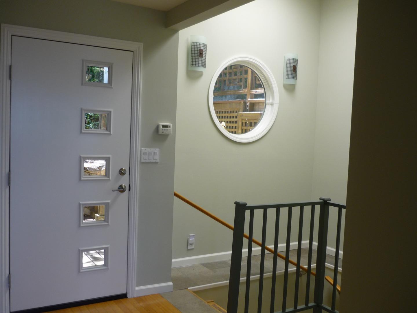 254 Swett Road Woodside, CA 94062 - Photo 3 of 24 a view of a hallway with wooden floor