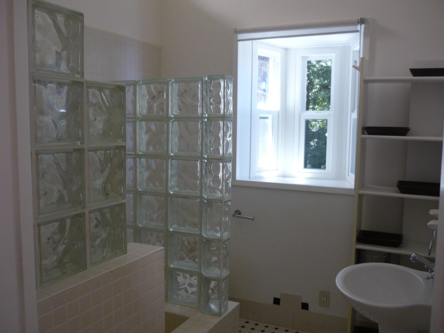 254 Swett Road Woodside, CA 94062 - Photo 9 of 24 a bathroom with a shower toilet and sink