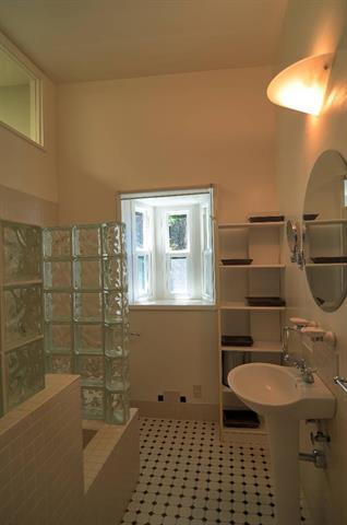 254 Swett Road Woodside, CA 94062 - Photo 10 of 24 a bathroom with a sink a toilet and shower