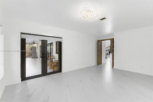 a view of a room with an empty space