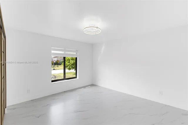 an empty room with a window