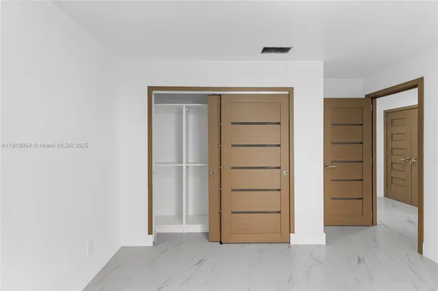 an empty room with closet