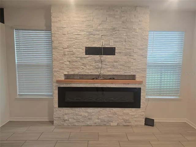 a bathroom with a sink and a fireplace