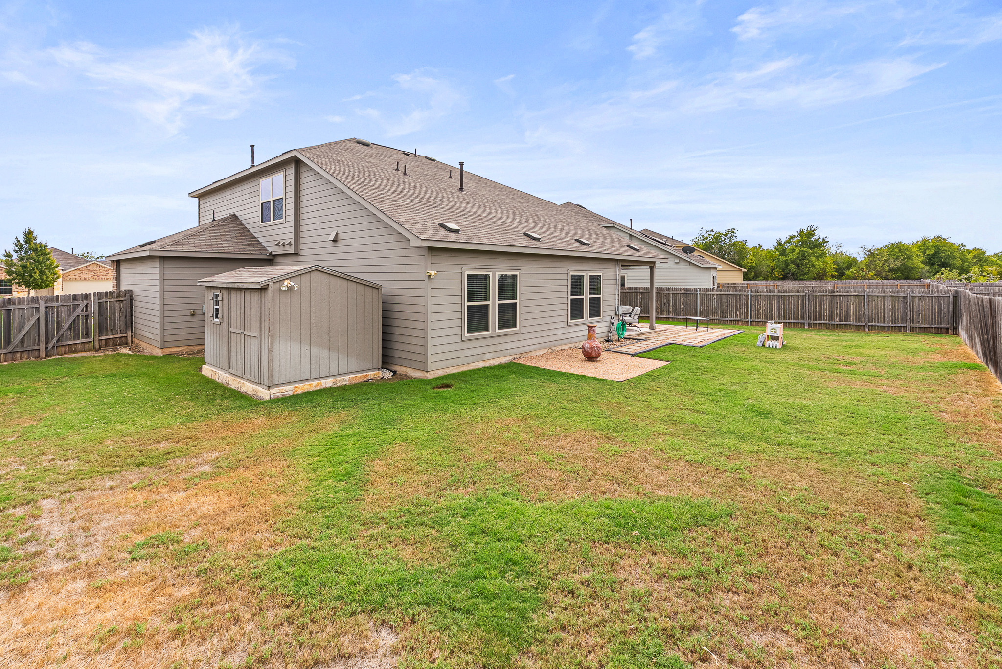 136 Copper Lane Kyle, TX 78640 - Photo 8 of 33 front view of a house with a yard