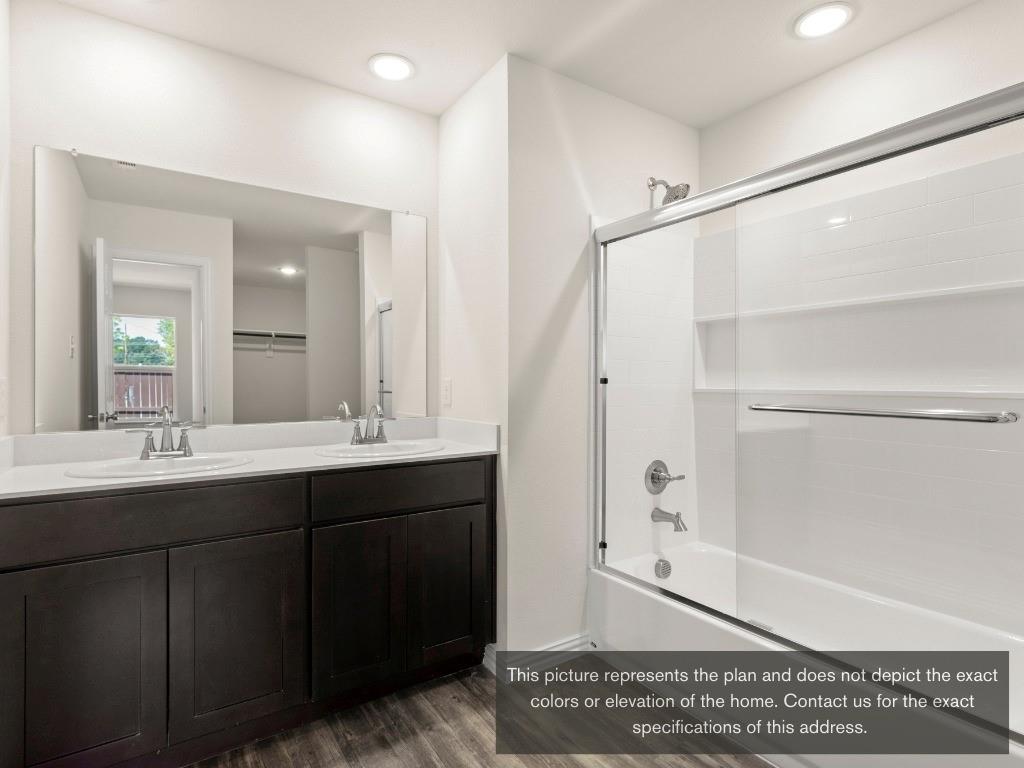 11433 Themis Court Lorena, TX 76655 - Photo 17 of 22 a bathroom with a sink and a mirror