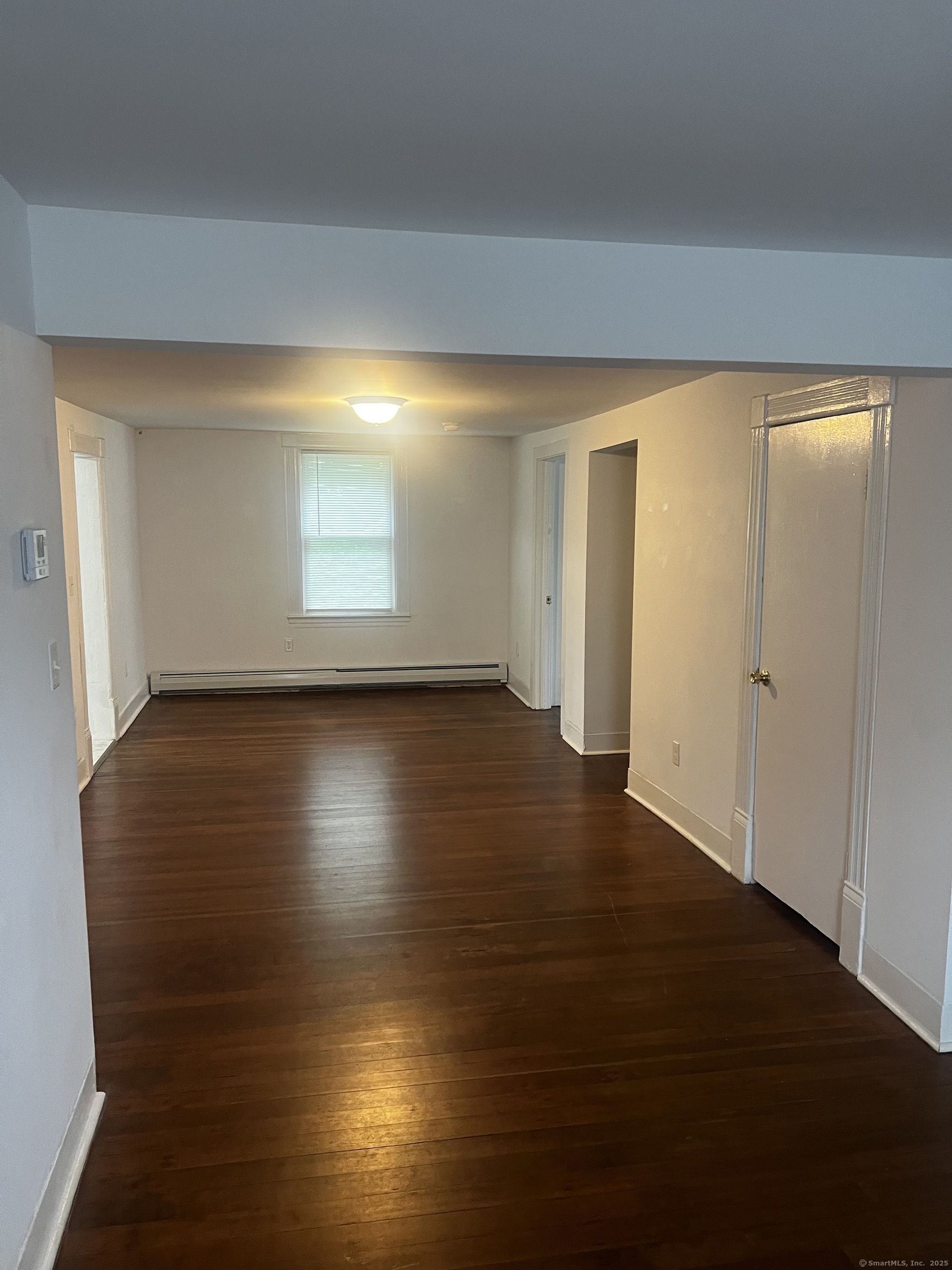 1 Farnsworth Street, Unit 2 New London, CT 06320 - Photo 15 of 21 an empty room with wooden floor and windows