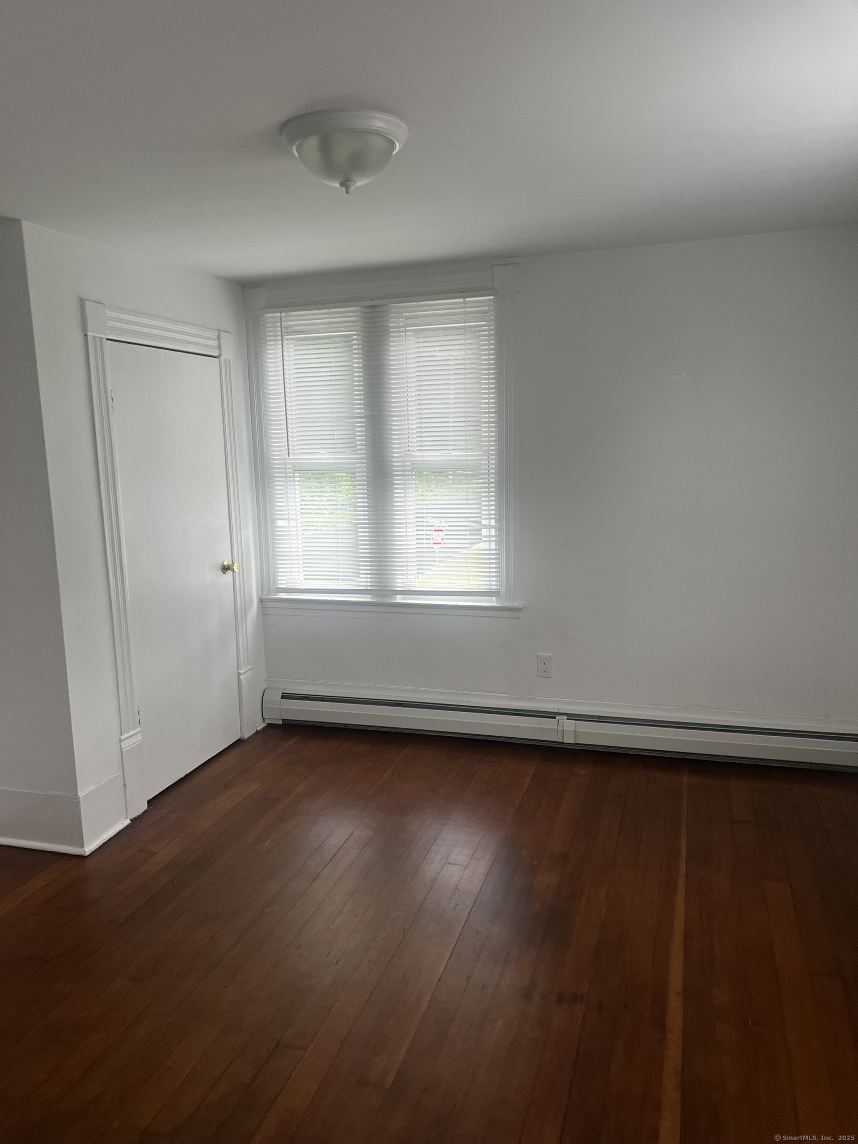 1 Farnsworth Street, Unit 2 New London, CT 06320 - Photo 20 of 21 an empty room with wooden floor and windows