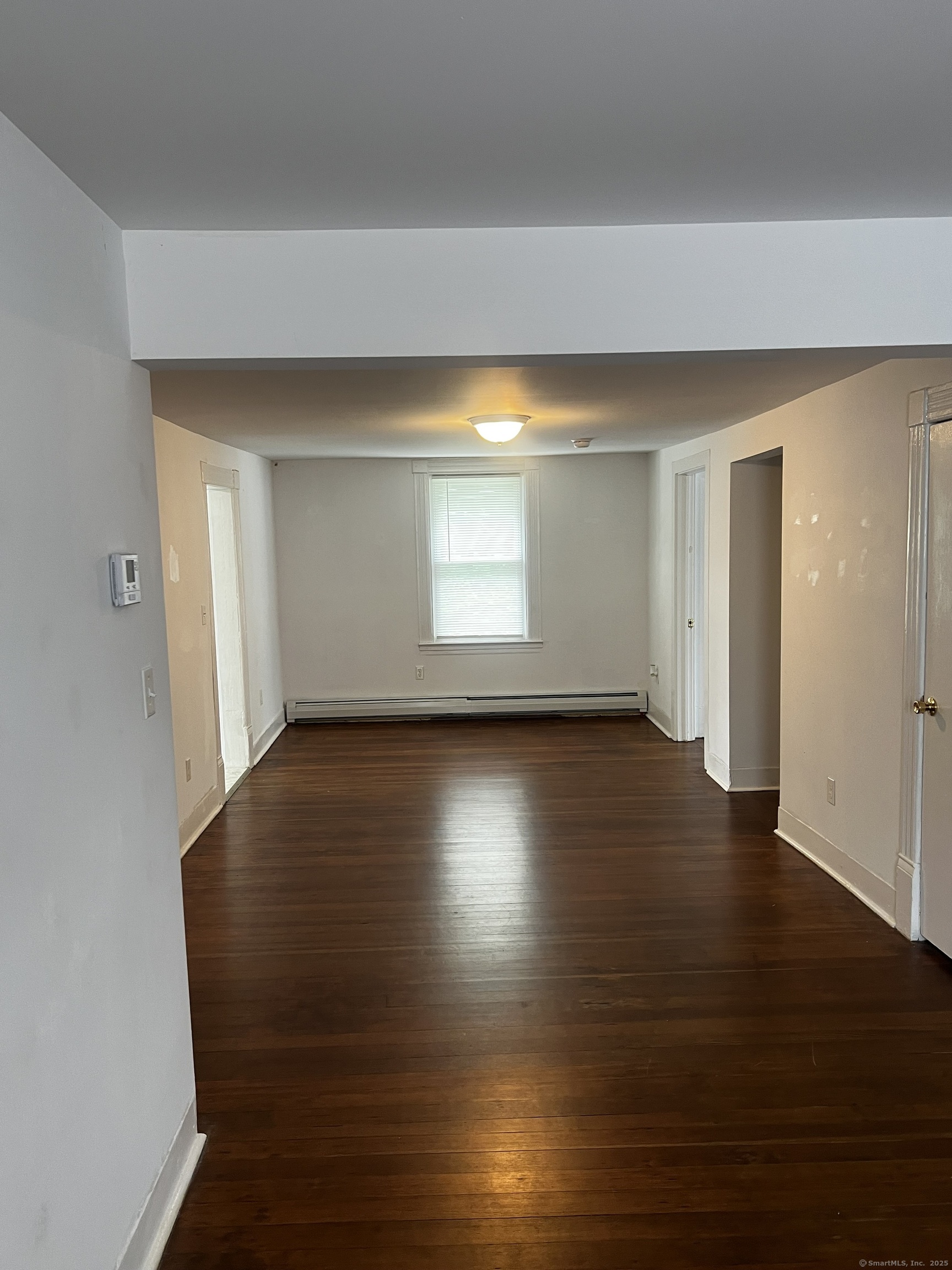 1 Farnsworth Street, Unit 2 New London, CT 06320 - Photo 21 of 21 an empty room with wooden floor and windows