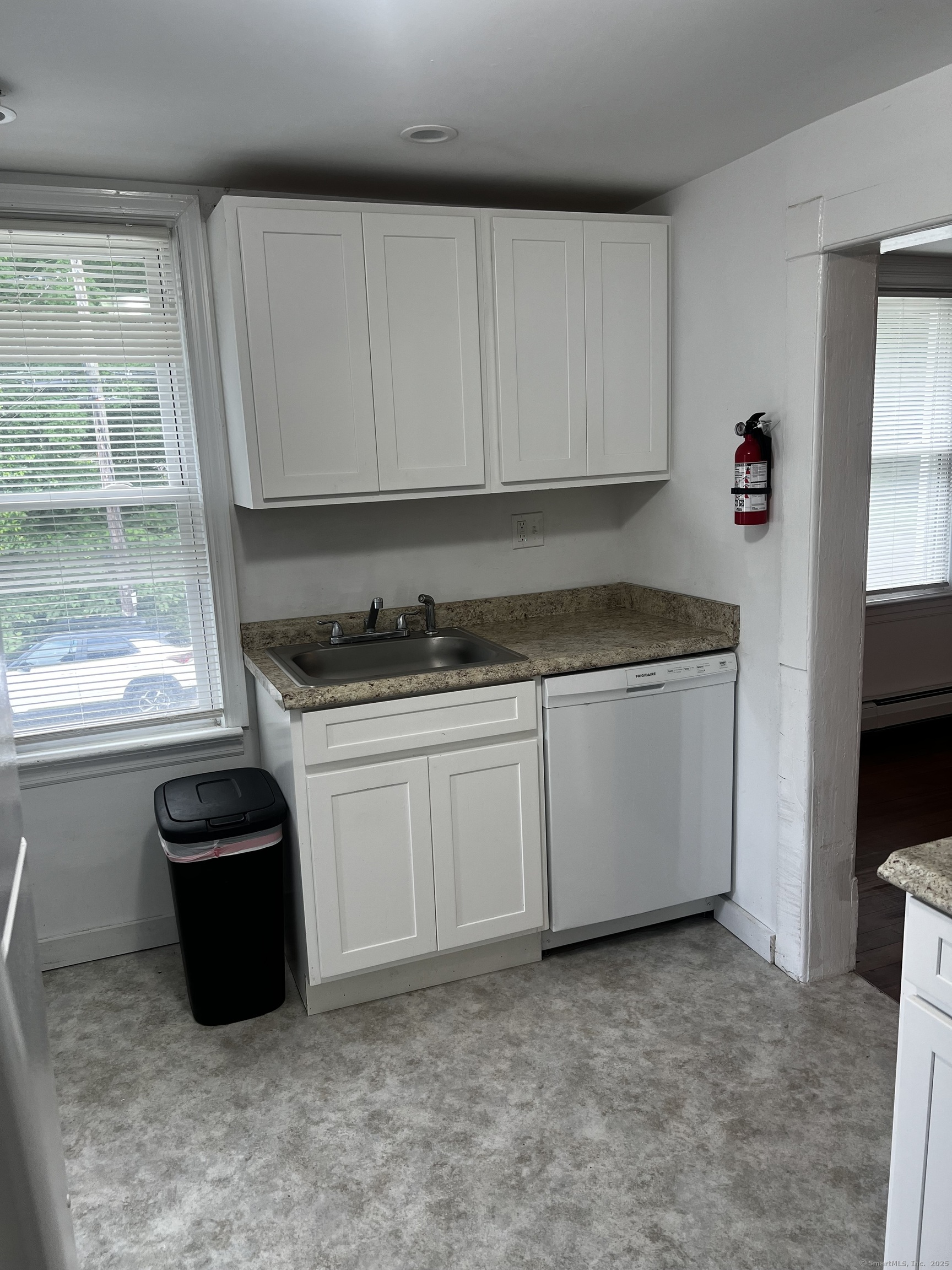 1 Farnsworth Street, Unit 2 New London, CT 06320 - Photo 6 of 21 a kitchen with a sink and a stove top oven