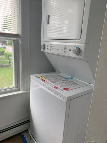 a utility room with washer and dryer