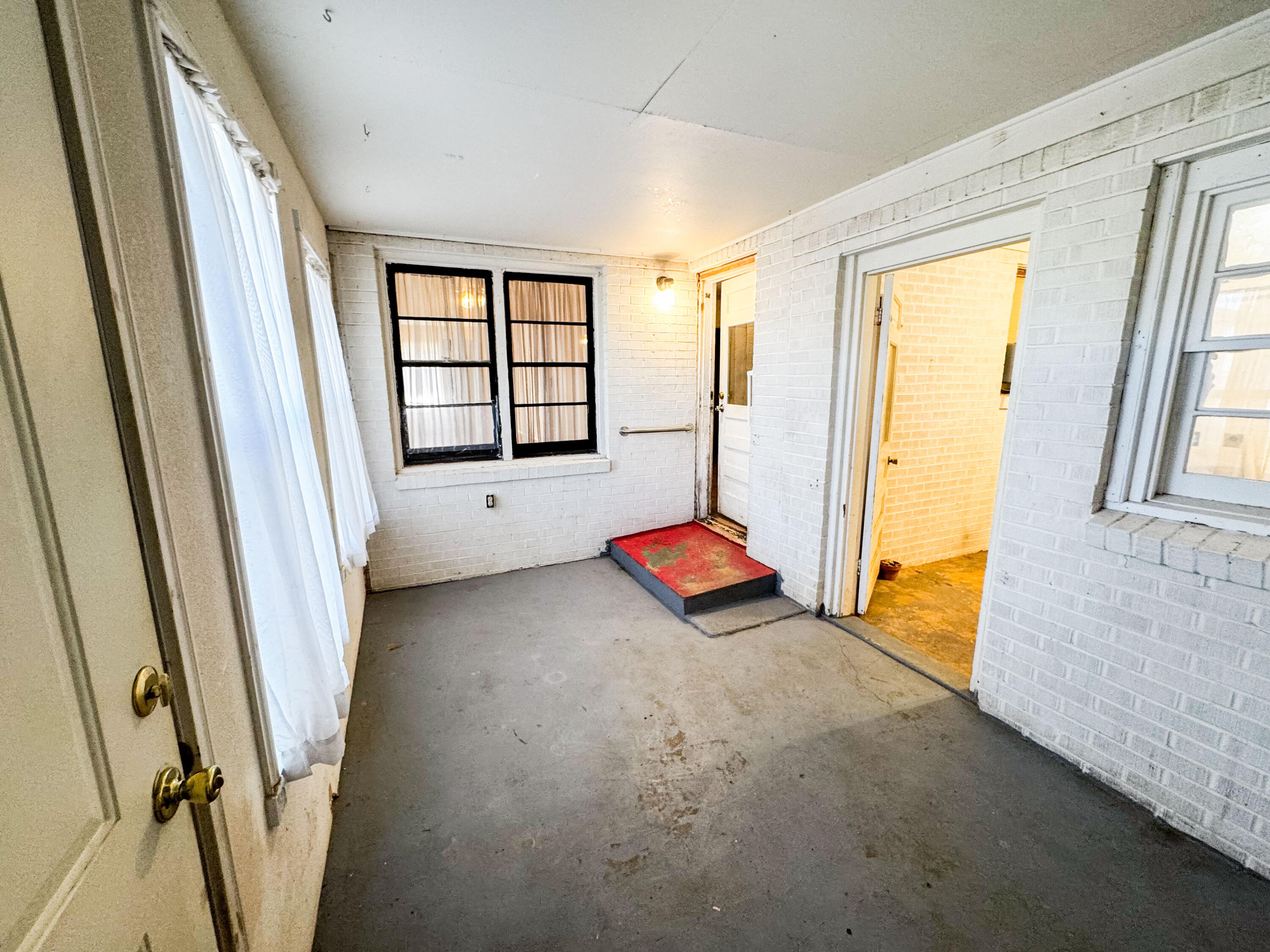 733 East 13th Street Littlefield, TX 79339 - Photo 11 of 15 a view of an empty room and a window