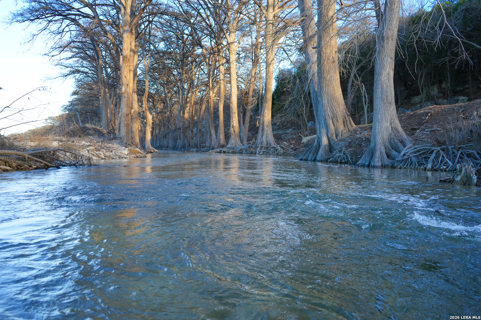 454 Center Point River Road Center Point, TX 78010 - Photo 12 of 18 a backyard of a house with lots of green space