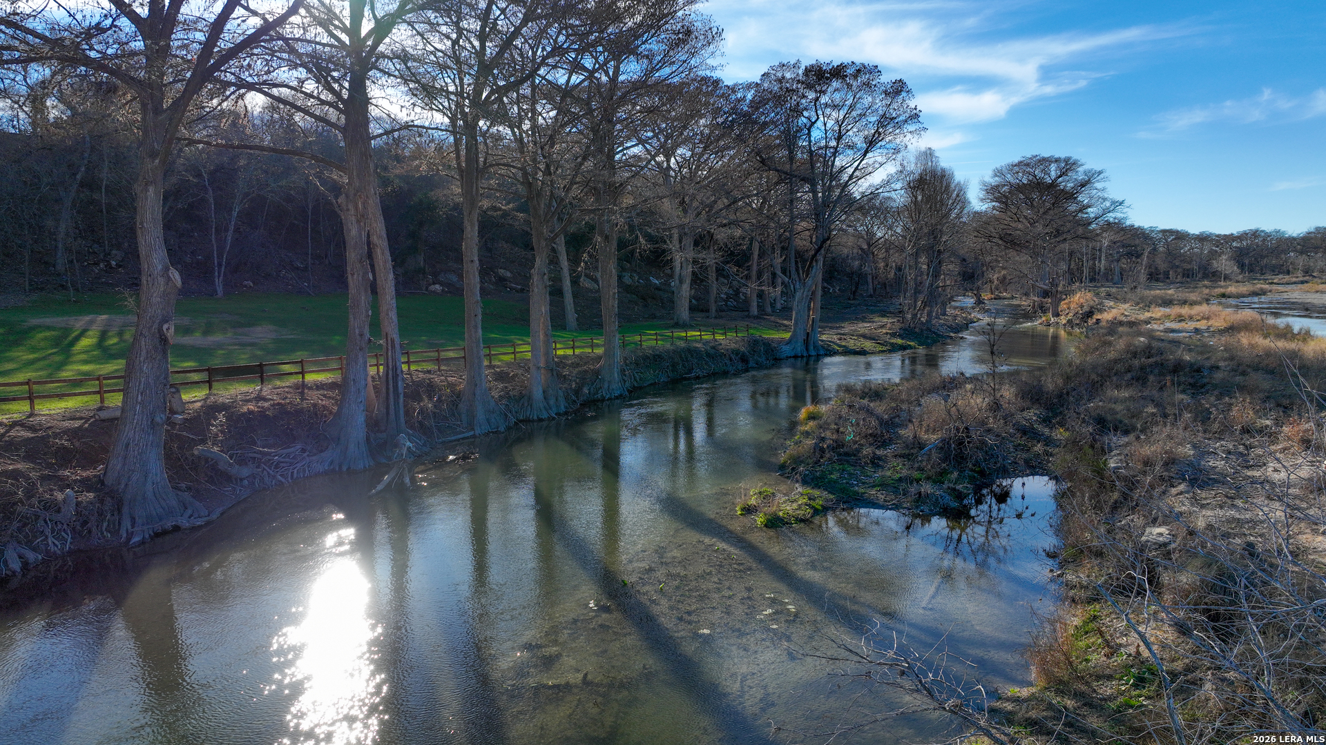 454 Center Point River Road Center Point, TX 78010 - Photo 3 of 18 a view of river and trees in the background