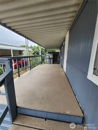 a view of swimming pool with furniture