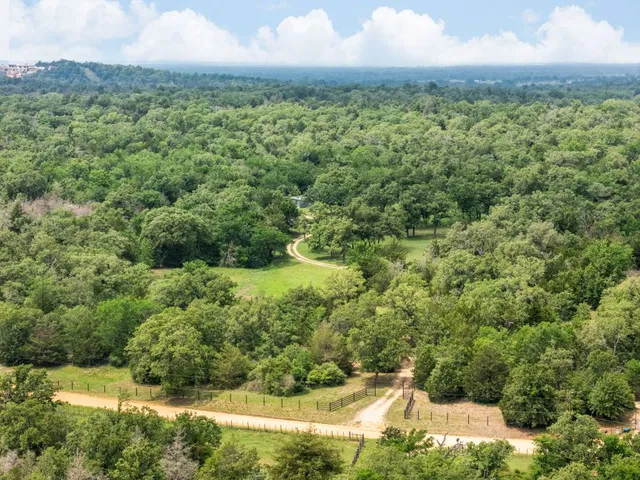 a view of a yard with an outdoor space