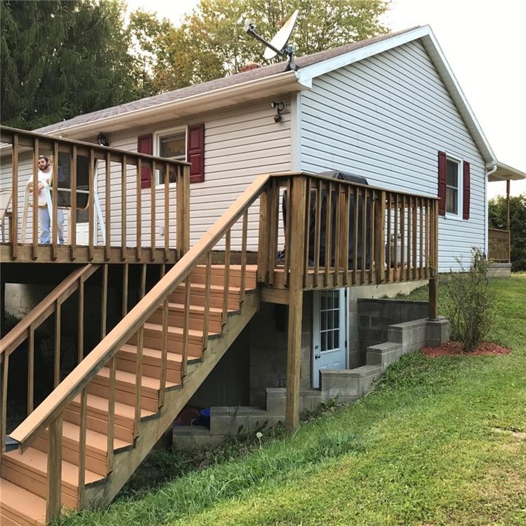 122 Hinchberger Road Butler, PA 16002 - Photo 20 of 21 Steps off of deck to the back yard and garage area.