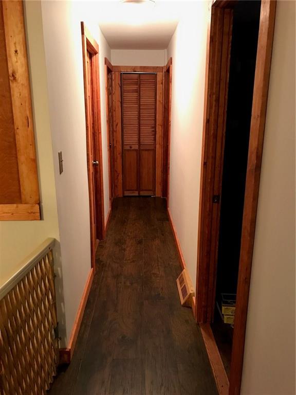122 Hinchberger Road Butler, PA 16002 - Photo 7 of 21 Hallway showcasing beautiful flooring, new trim and doors!!