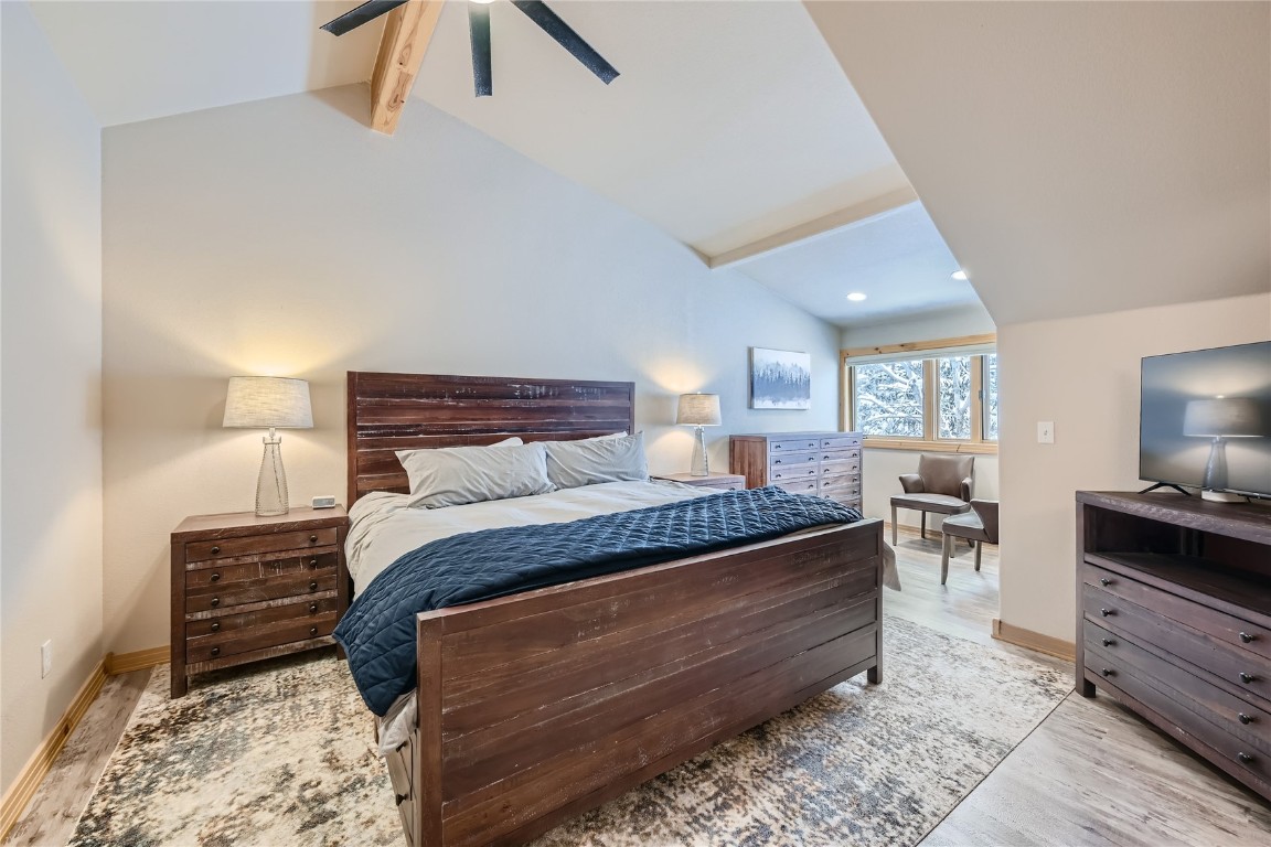 400 Kings Crown Road, Unit 400 Breckenridge, CO 80424 - Photo 12 of 40 a bed room with a bed and a television