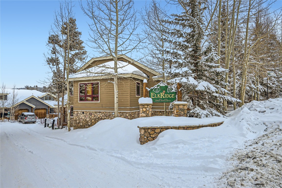 400 Kings Crown Road, Unit 400 Breckenridge, CO 80424 - Photo 31 of 40 a view of a house with a snow in the yard