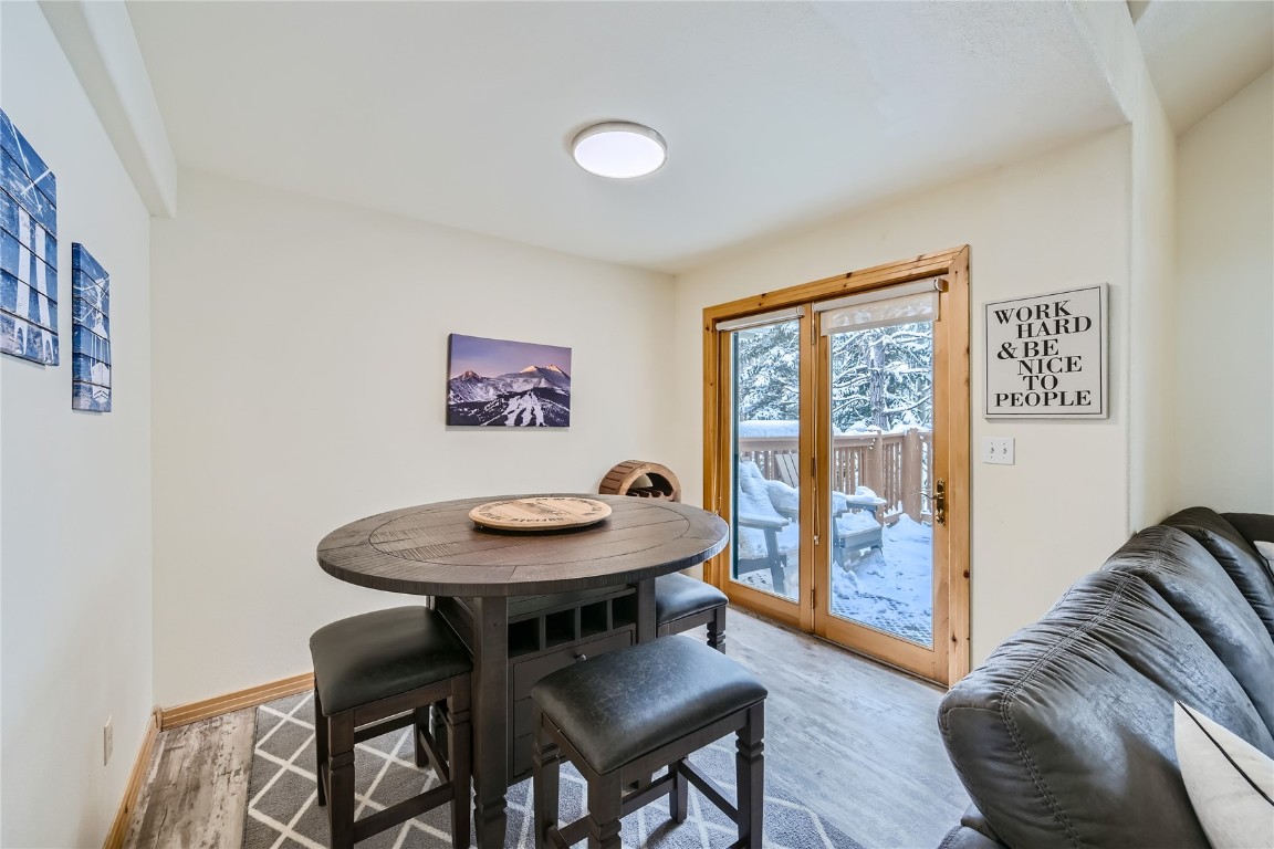 400 Kings Crown Road, Unit 400 Breckenridge, CO 80424 - Photo 9 of 40 a view of a room with furniture and wooden floor