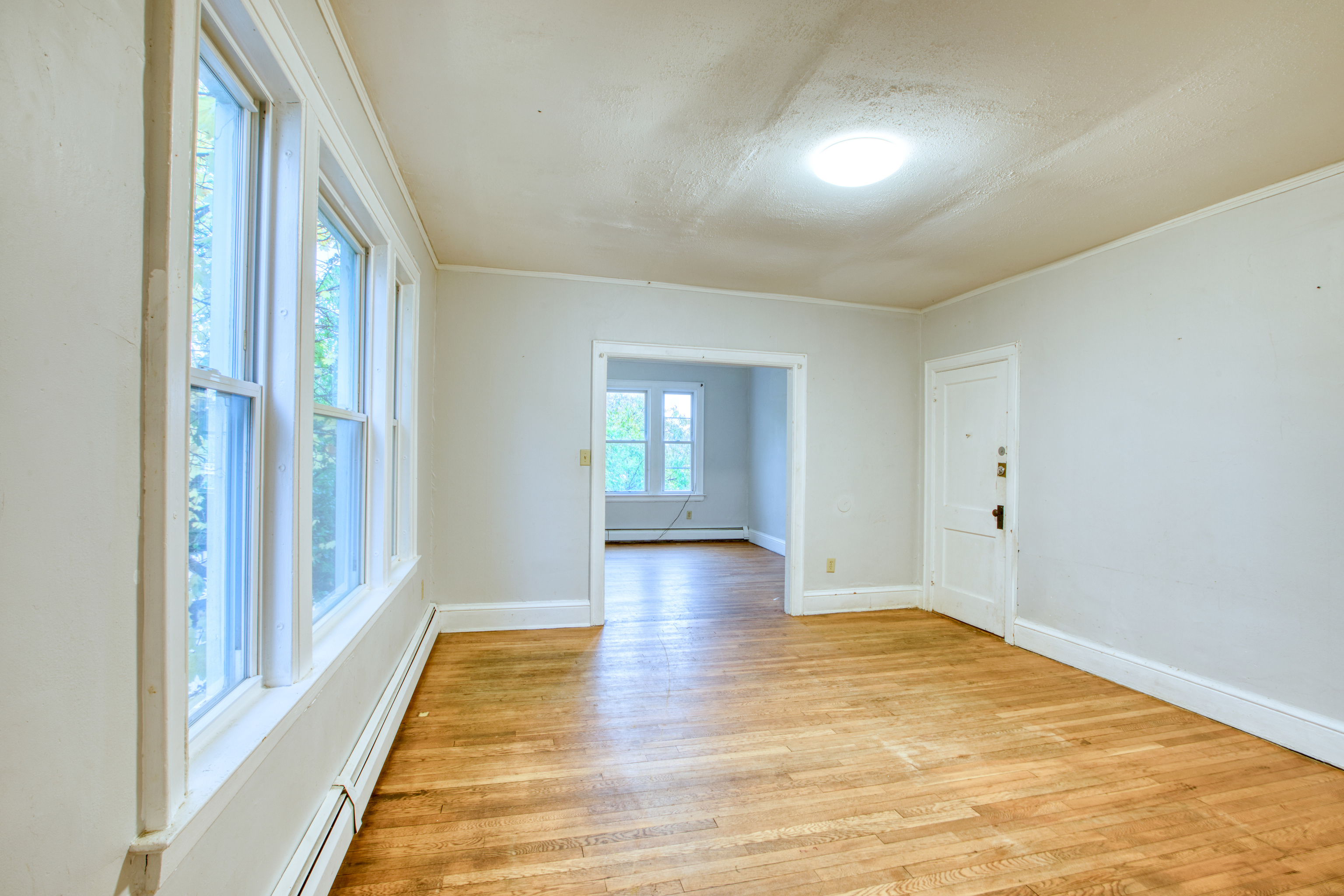 429 New Britain Avenue Hartford, CT 06106 - Photo 7 of 20 a view of empty room with wooden floor