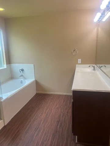a bathroom with a sink and a bathtub