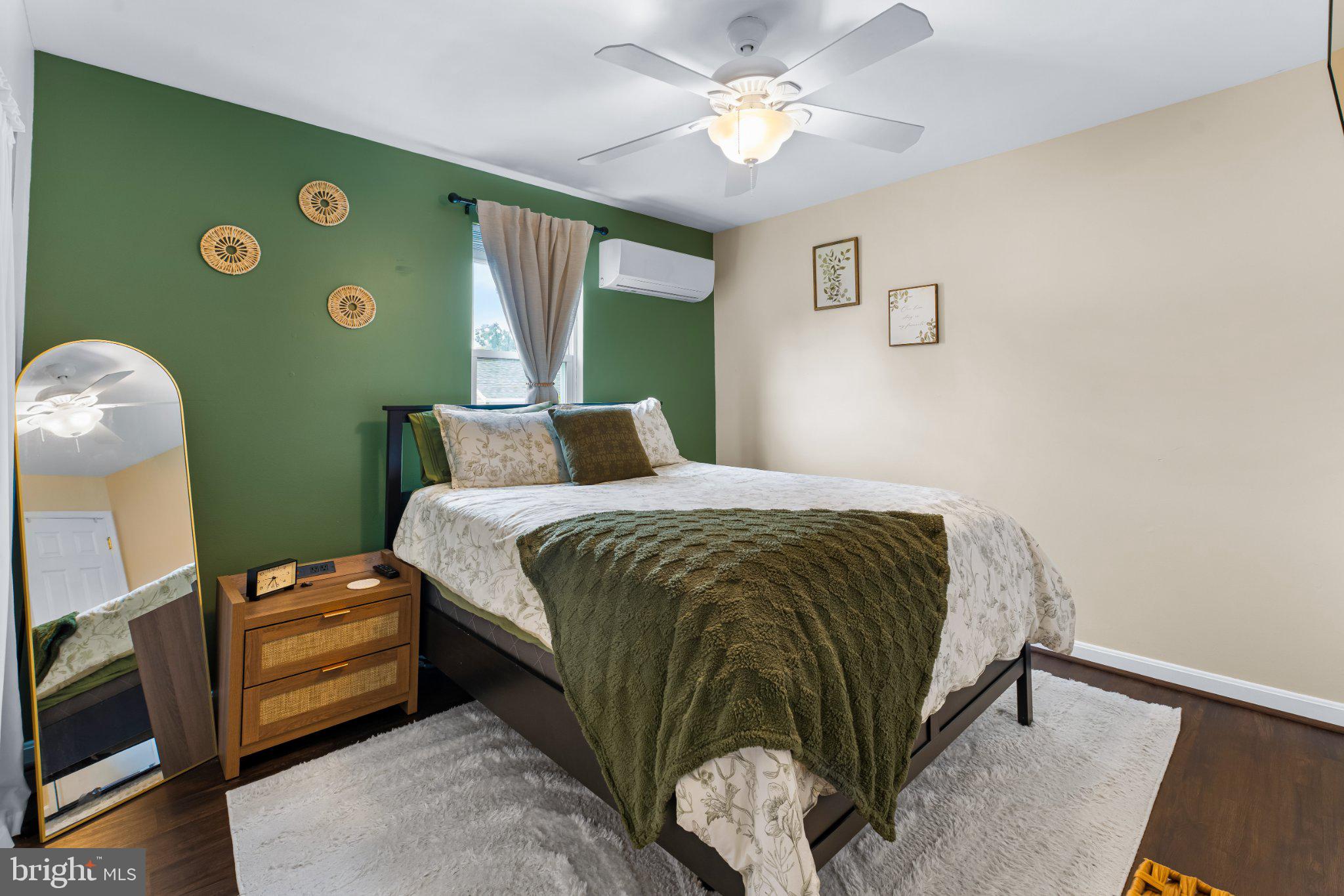 7800 Appletree Road Pasadena, MD 21122 - Photo 18 of 33 Serene bedroom with calming hues.
