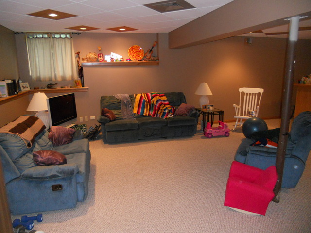 97 Monee Road Park Forest, IL 60466 - Photo 21 of 25 a living room with furniture and a lamp