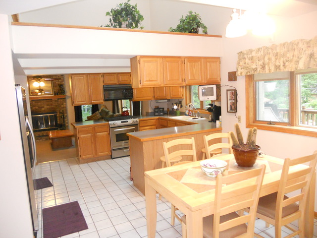 97 Monee Road Park Forest, IL 60466 - Photo 5 of 25 a kitchen with a sink and counter top
