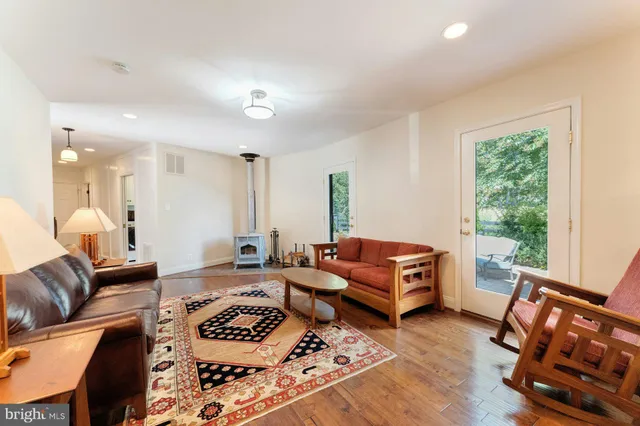 a view of a kitchen with a table and chairs