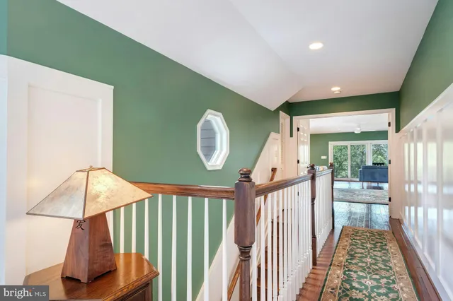 a view of house with a swimming pool