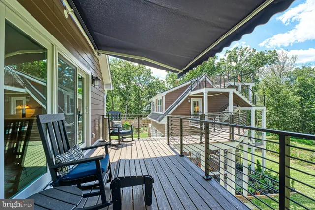 a kitchen with stainless steel appliances a refrigerator and a stove top oven
