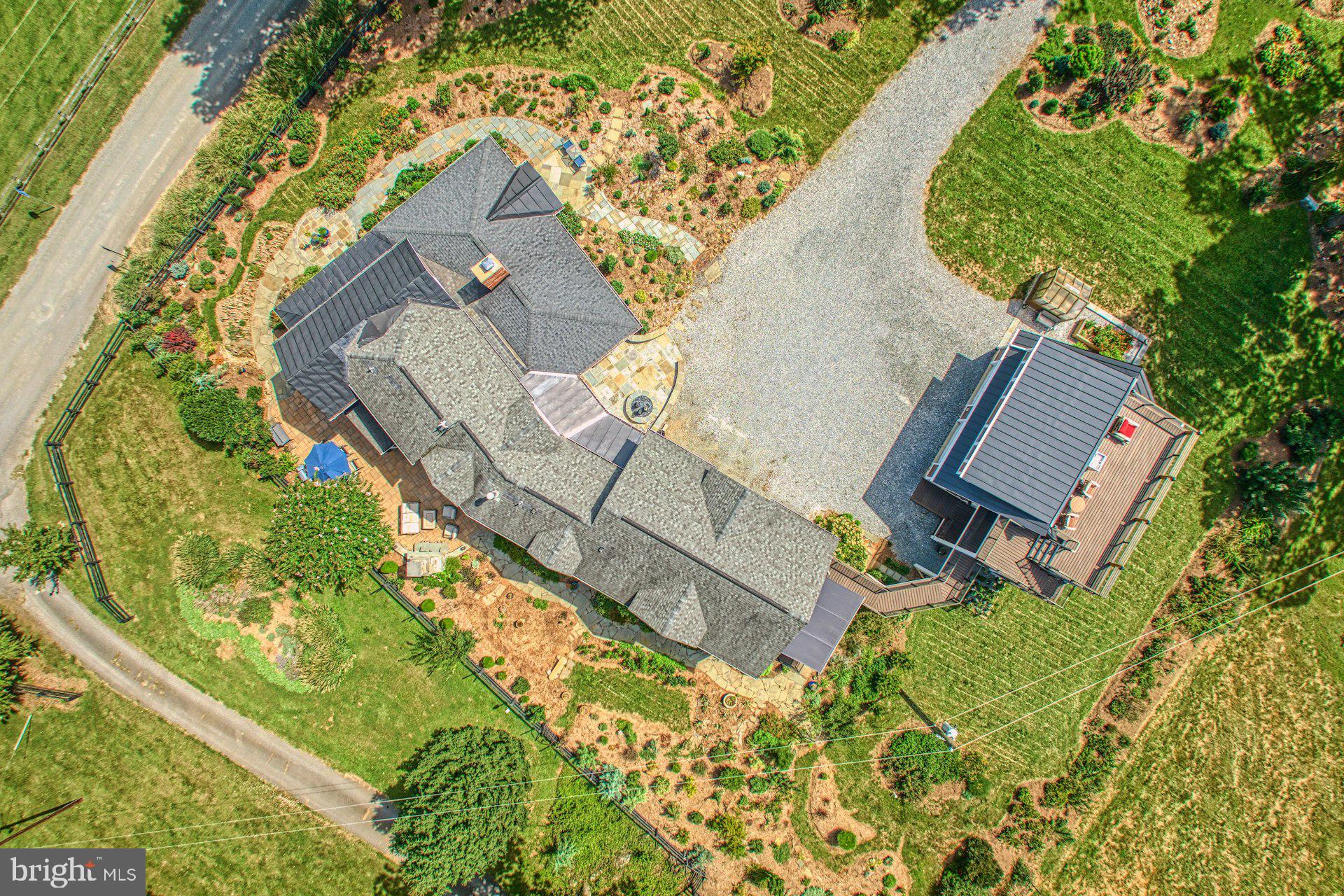 16555 Old Waterford Road Paeonian Springs, VA 20129 - Photo 84 of 92 an aerial view of a house with a yard and trees
